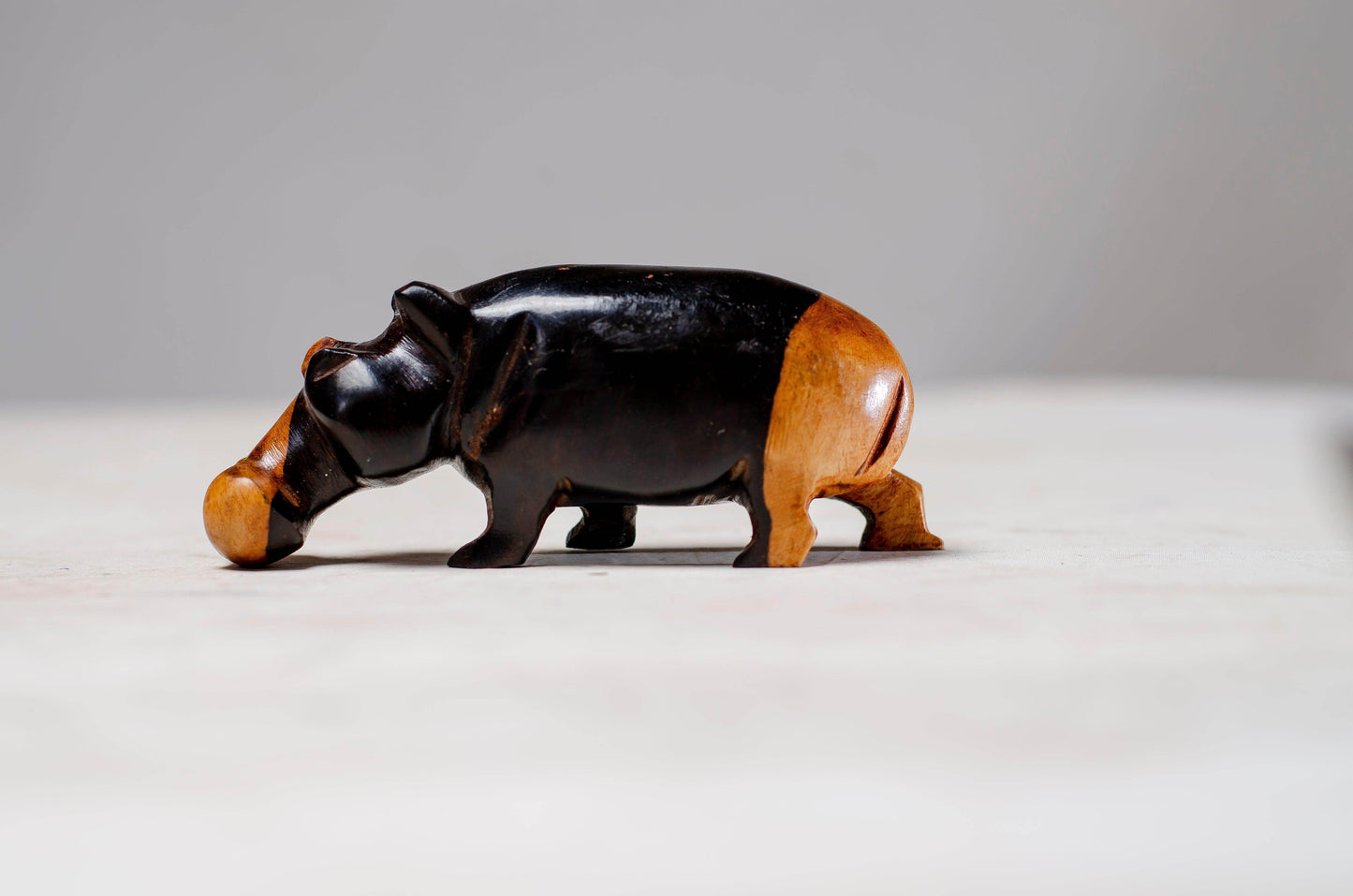 A BEAUTIFULLY HAND CARVED HIPPO FROM IRON WOOD - PRODUCT PARADISE STORE