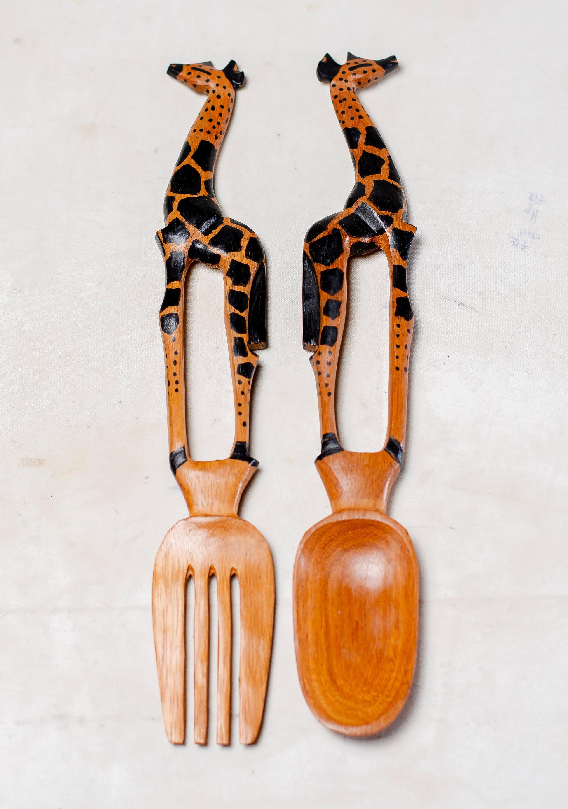 wooden giraffe couple salad spoon and fork