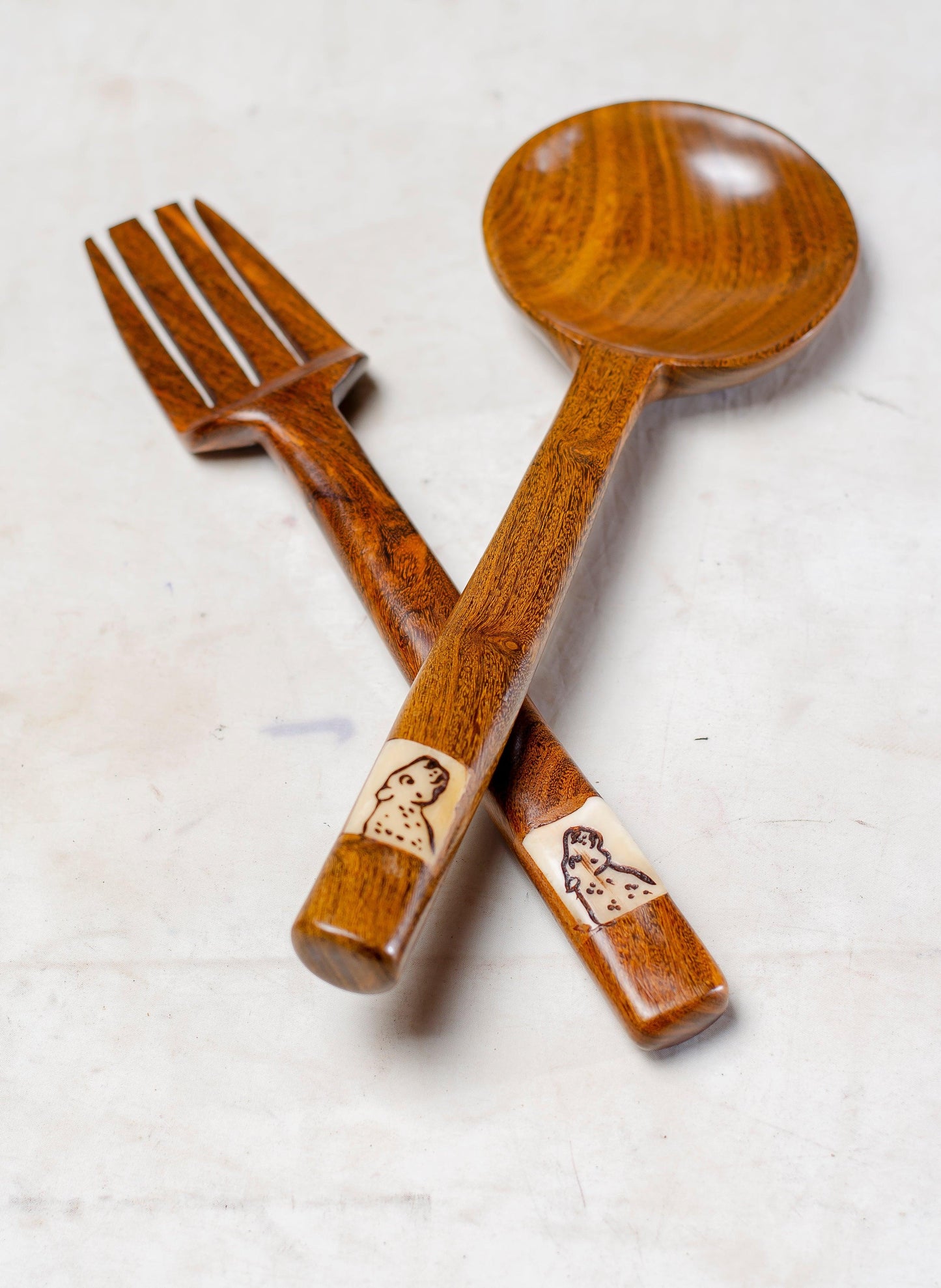 wooden  salad round spoon and fork