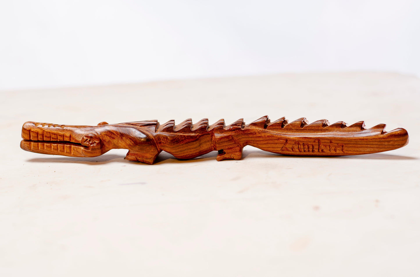 wooden carved bottle opener