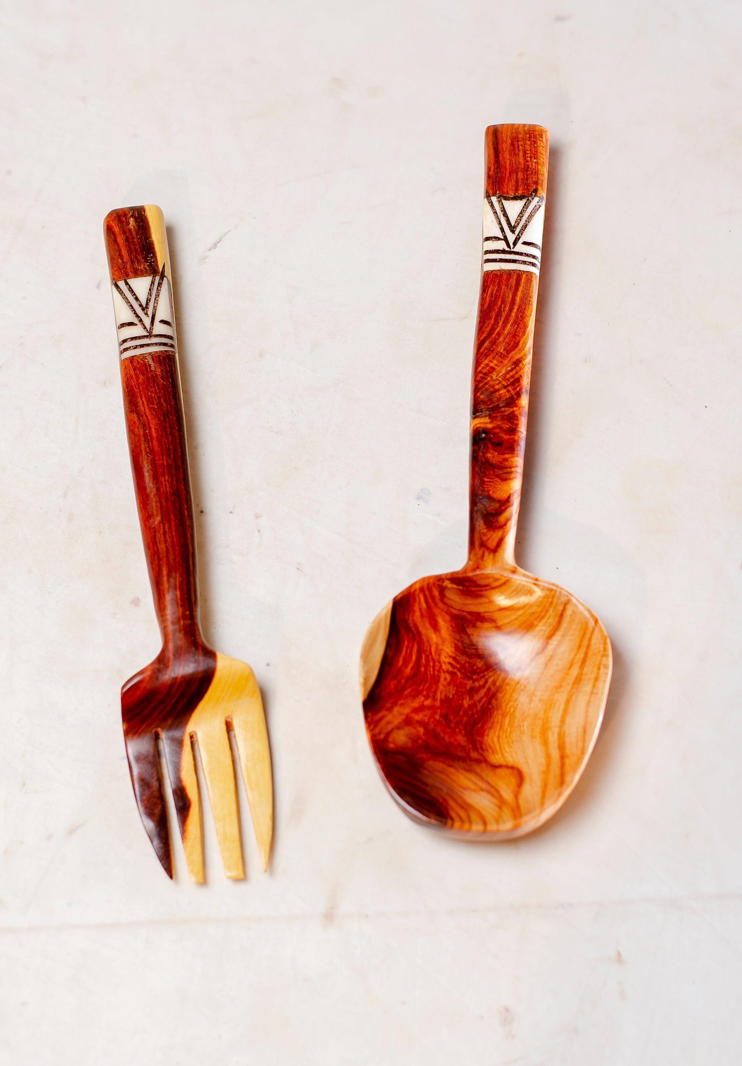 wooden round salad spoon and fork